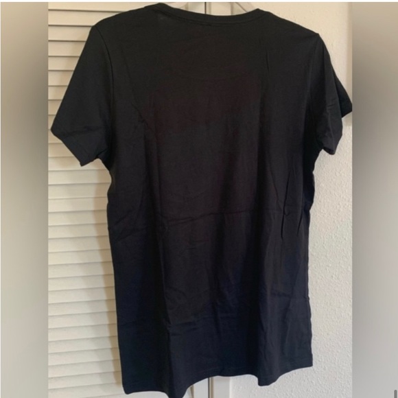 •Naughty & Nice•black/white graphic T-shirt
New with tags! - Picture 5 of 5